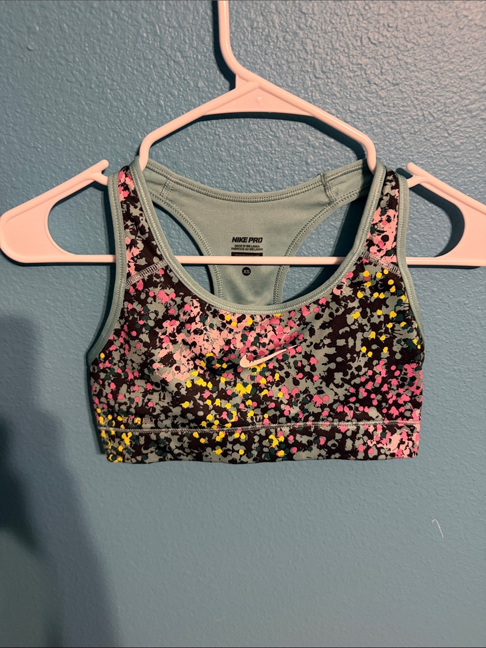 Nike Pro women’s Teal Sports Bra with Pink Black & Yellow Splatter